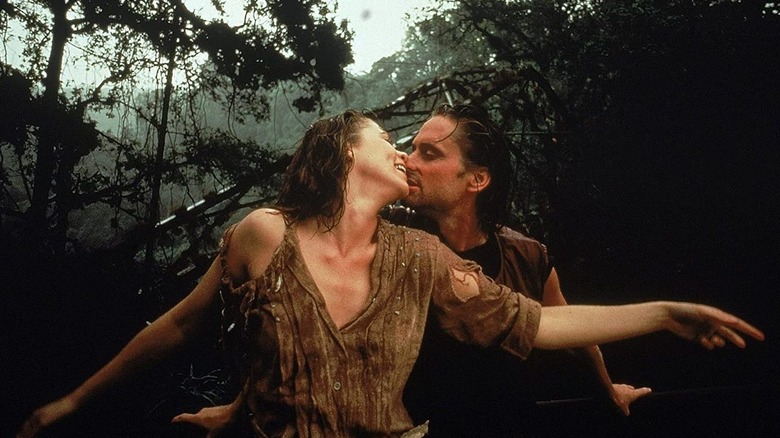 Joan and Jack getting intimate in the jungle in "Romancing the Stone"