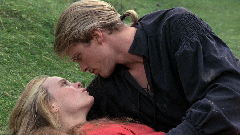 Buttercup and Westley embracing each other at the bottom of a steep hill in "The Princess Bride"