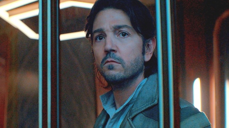 Cassian looking out a window in Andor (2022)