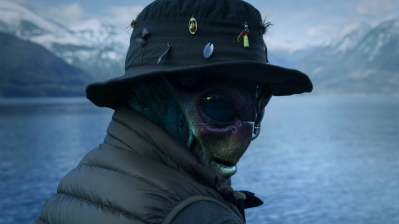 Harry Vanderspeigle wearing a fishing hat in "Resident Alien"
