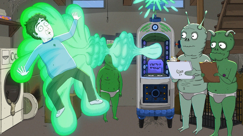 Jeff in a green bubble while two aliens write on clipboards in "Jeff & Some Aliens."