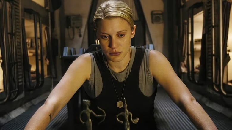 Starbuck lost in thought in "Battlestar Galactica"