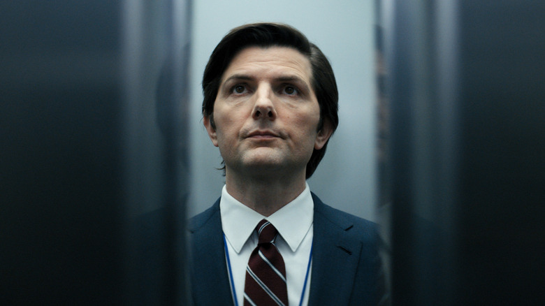 Mark standing in an elevator in "Severance"