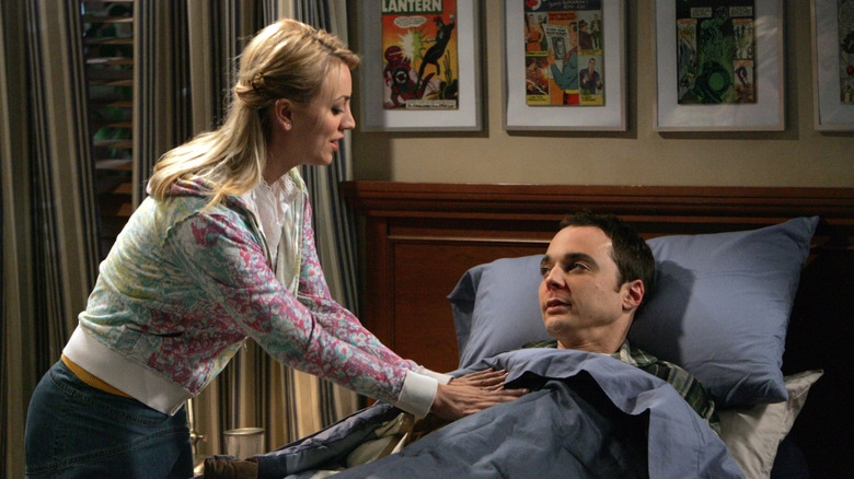 Penny tucks Sheldon in during "The Big Bang Theory"
