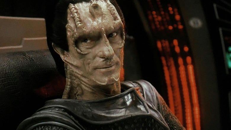 Gul Dukat sitting in a chair in "Star Trek: Deep Space Nine"