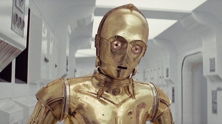 C-3PO speaking with R2-D2 aboard the Tantive IV in "Star Wars: A New Hope"