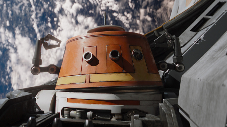 Close-up of Chopper in a ship with a planet in the background in "Ahsoka"