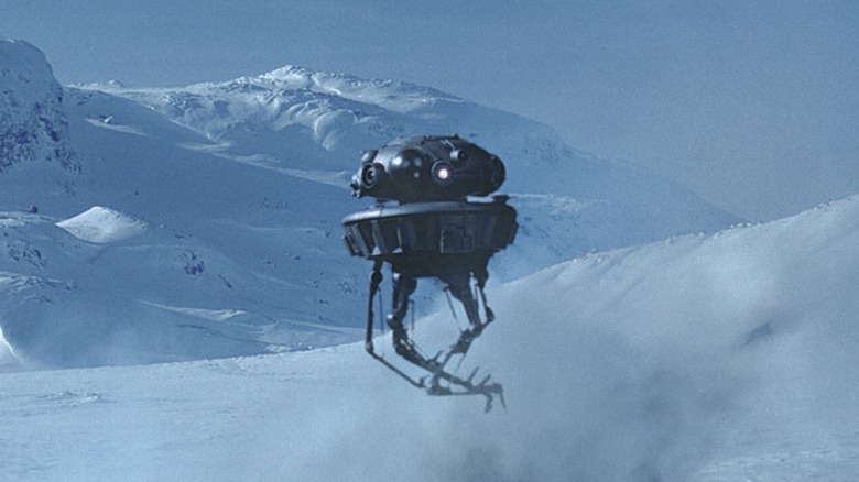 An Imperial probe droid hovering over the snowy fields of Hoth in "Star Wars: The Empire Strikes Back"