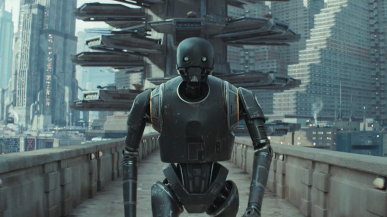 K-2SO walking over a bridge on Coruscant in "Andor" Season 2
