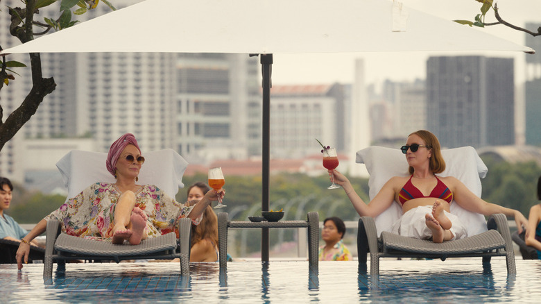 Deborah and Ava holding cocktails in