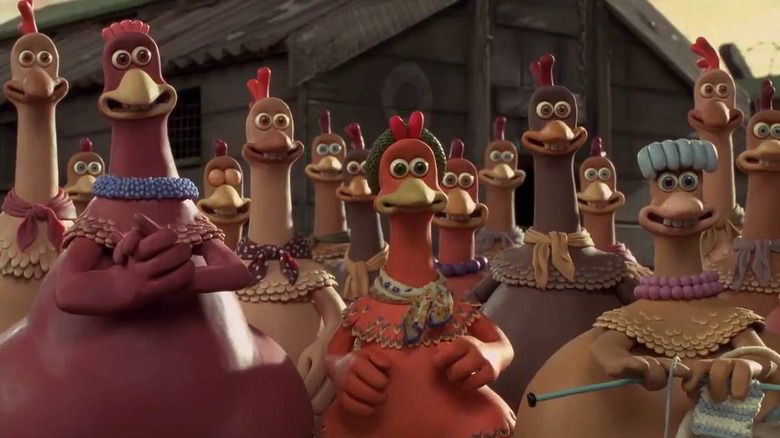 The Chickens stand at attention outside the barn in Chicken Run