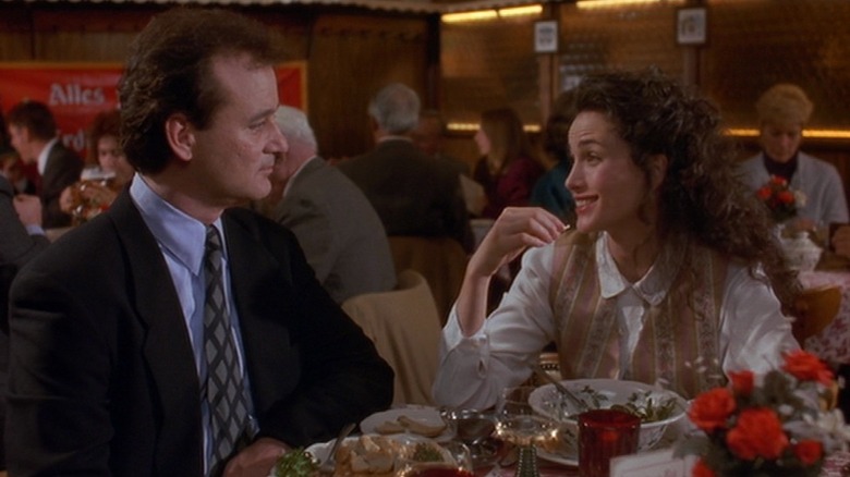 Phil and Rita sit at dinner in Groundhog Day