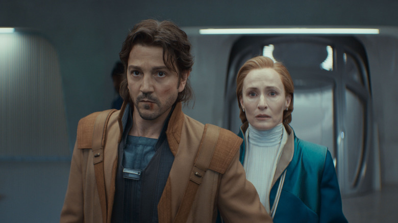 Cassian Andor escorting Senator Mon Mothma in Andor season 2 (2024)