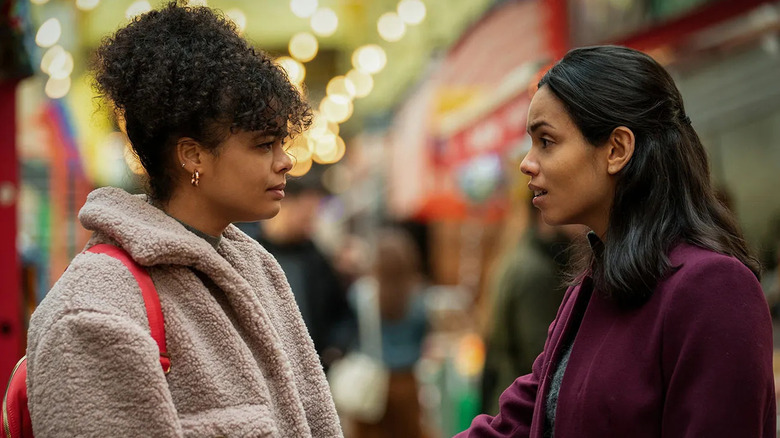 Vanessa and Natalie talk in a market in Suspicion