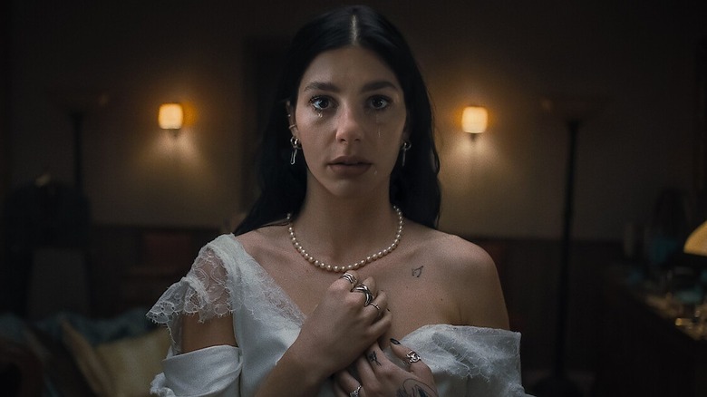 Rachel crying in a wedding dress in "Something Very Bad Is Going to Happen"