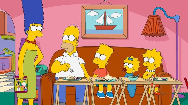 Marge glaring at Homer, Bart, Maggie, and Lisa in "The Simpsons"