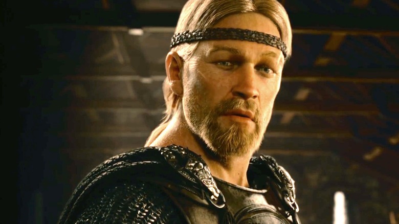 Beowulf standing inside with his armor on in "Beowulf"