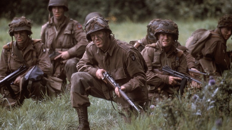 Maj. Winters and his men kneeling in the brush in "Band of Brothers"