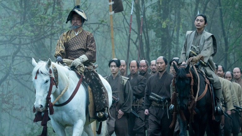 Commanders on horseback, including Lord Toranaga, leading men in formation in "Shōgun"