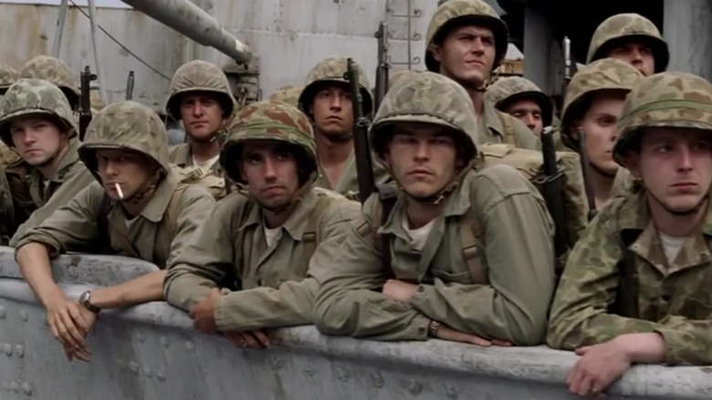 Marines gathered around the side of a ship in "The Pacific"