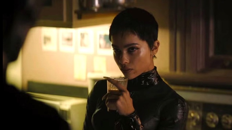 Selina Kyle sips a cocktail in "The Batman"