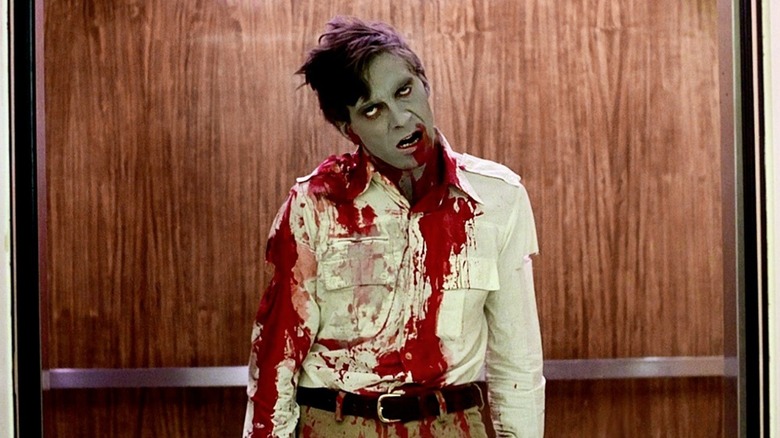 A zombie rides in an elevator in "Dawn of the Dead" (1978)