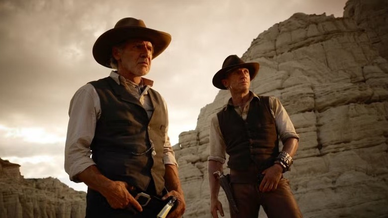 Woodrow Dolarhyde and Jake Lonergan standing together in Cowboys & Aliens (2011)