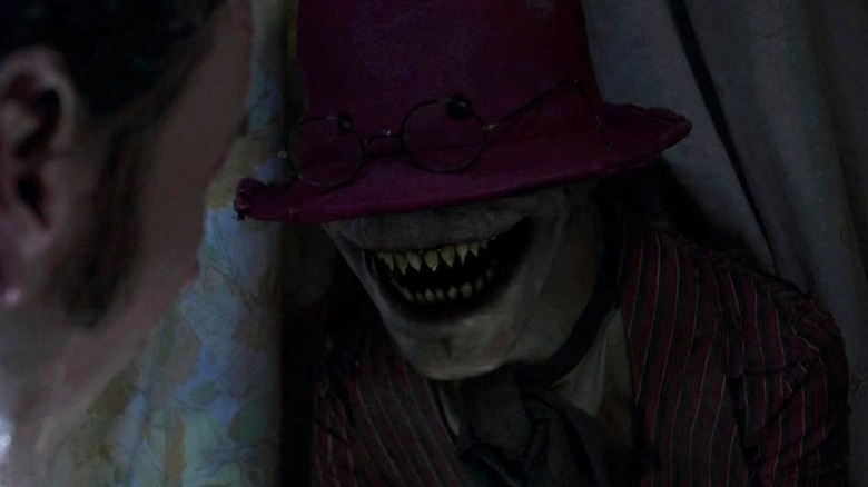 The Crooked Man smiling in The Conjuring 2