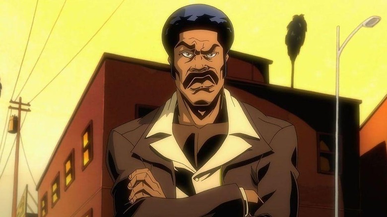Black Dynamite folding his arms in Black Dynamite