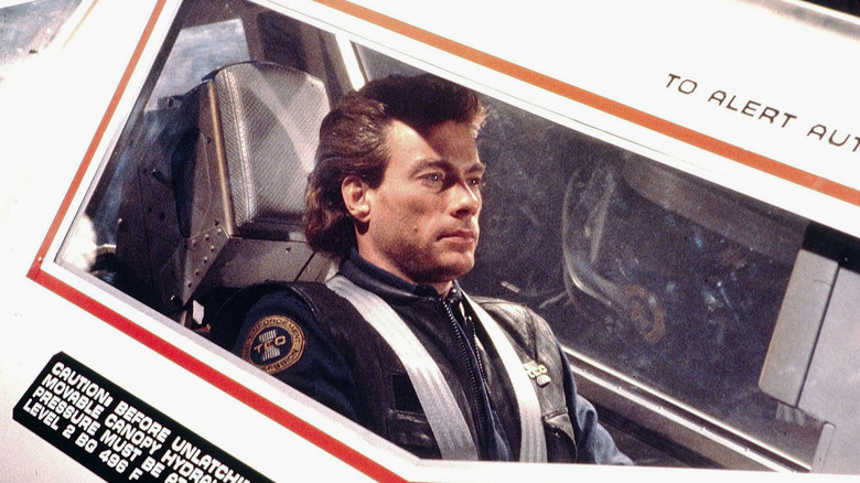 Max Walker strapped into a time-travel machine in Timecop (1994)