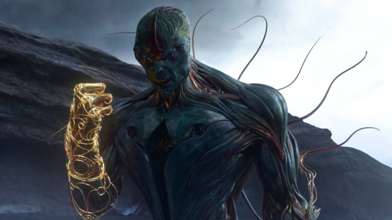 Kro sneering with a balled up glowing fist in Eternals (2021)