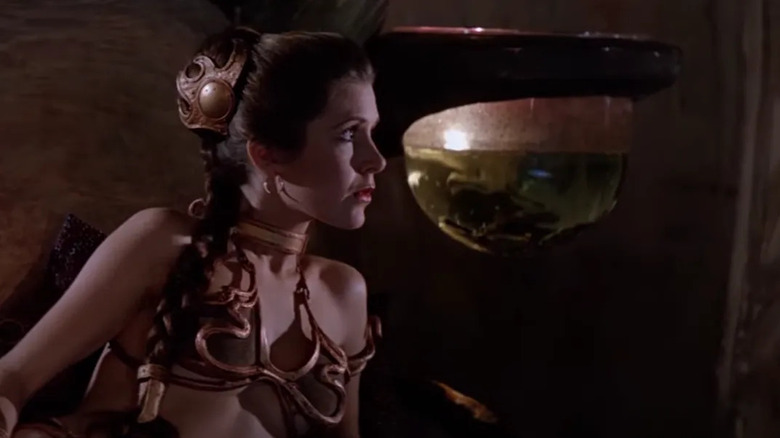 Princess Leia in a metallic bikini in Jabba the Hutt's Palace in Star Wars: Return of the Jedi