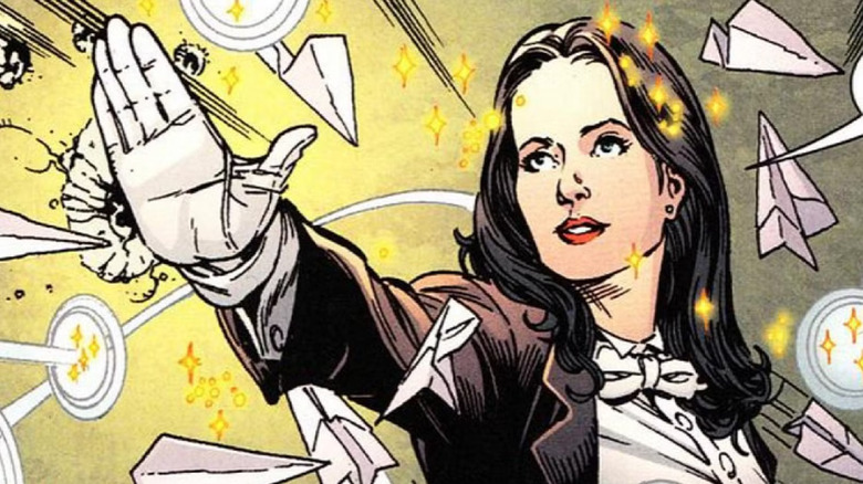 Zatanna using her magic to levitate and aim multiple paper airplanes