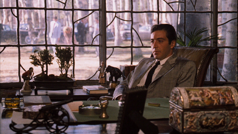 Michael Corleone sits at a desk in "The Godfather Part II" (1974)