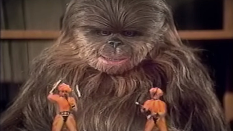 Itchy plays with two action figures in The Star Wars Holiday Special