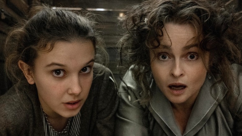 Enola Holmes' Millie Bobby Brown looking concerned with Helena Bonham Carter