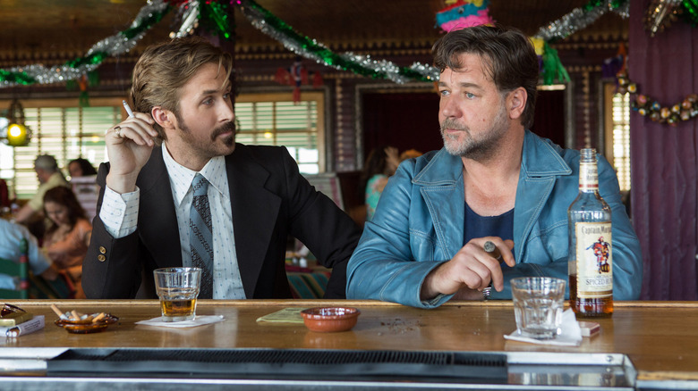 Holland and Jackson smoking and drinking at a bar together on The Nice Guys