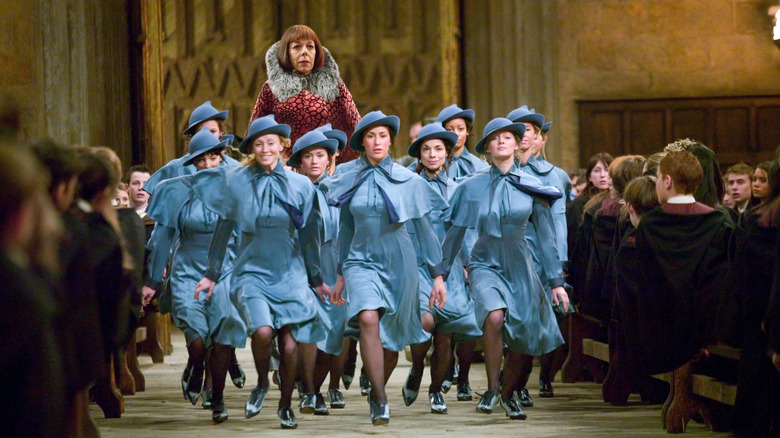 Beauxbatons students with Madame Maxime behind them in the Great Hall in Harry Potter and the Goblet of Fire