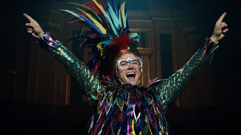 Elton John celebrating in another flashy outfit in "Rocketman" (2019)
