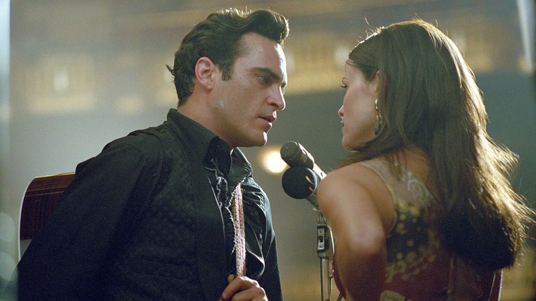 Johnny and Carter Cash performing in "Walk the Line" (2005)