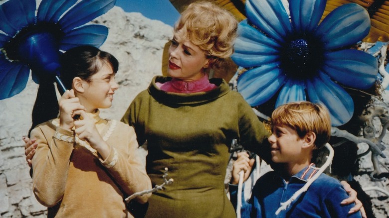 Maureen with her arms around Penny and Will in "Lost in Space."