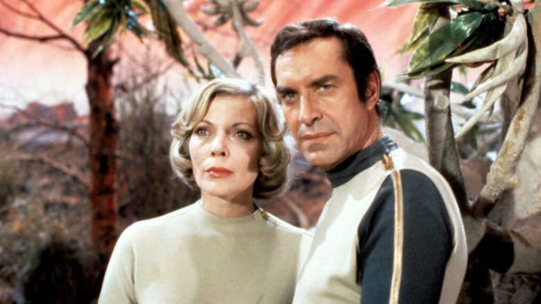 Dr. Helena Russell and Commander John Koenig frowning in "Space: 1999."