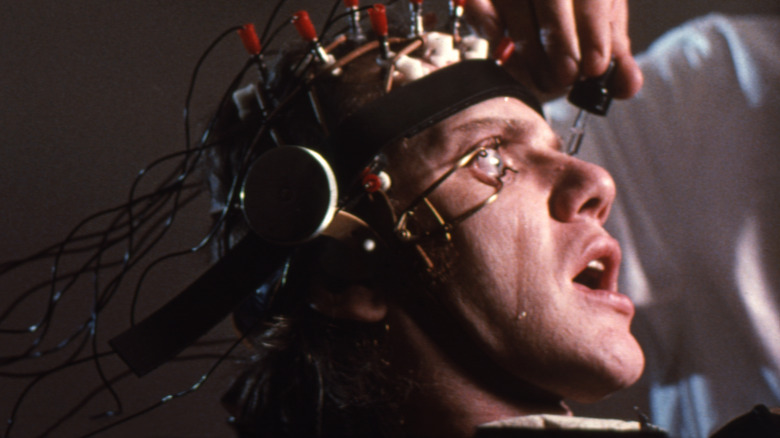 Alex has eyedrops put in his eyes in 'A Clockwork Orange' (1971)