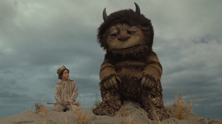 Max and Carol sit on a sand dune in 'Where the Wild Things Are' (2009)