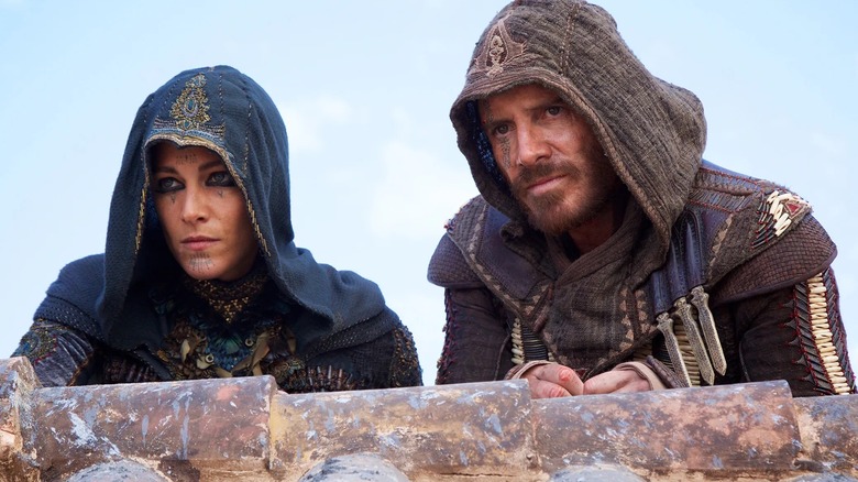 A pair of assassins waiting to kill in "Assassin's Creed" (2016)
