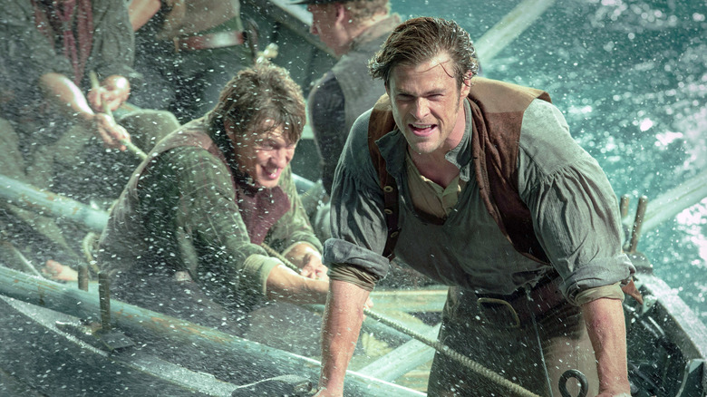 Owen Chase and comrades surviving the storm in "In the Heart of the Sea" (2015)