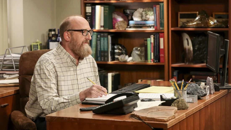 Bert sitting alone in his office on The Big Bang Theory