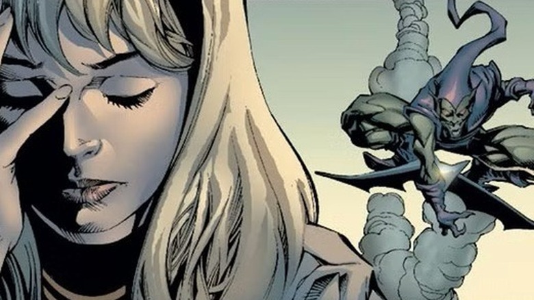 Gwen holds her face while Green Goblin flies in the background