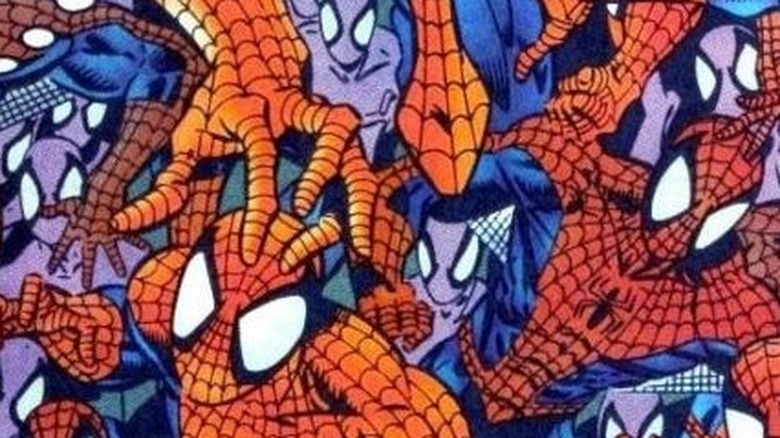 A group of Spider-Man clones climb all over one another