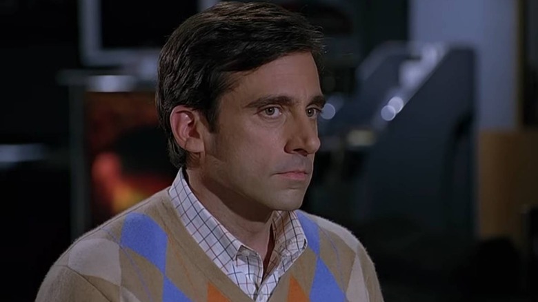 Andy Stitzer sitting awkwardly in 